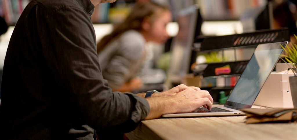 Caucasian business manager work with serious and concentrate using laptop